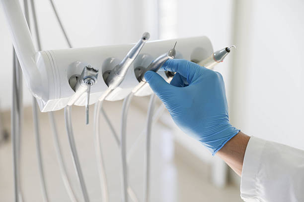 Professional Tooth Extraction technician working in Linden, TN